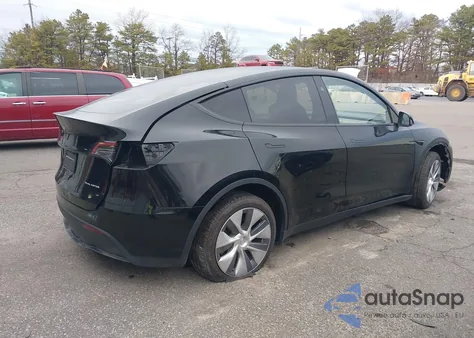 2023 Tesla Model Y Awd/Long Range Dual Motor All-Wheel Drive z USA, uszkodzony, nr VIN 7SAYGDEE2PA187134